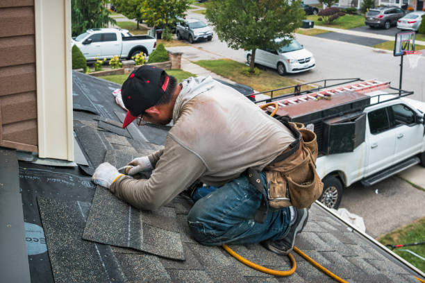 Professional Gutter Repair And Installation technician working in Phippsburg, ME